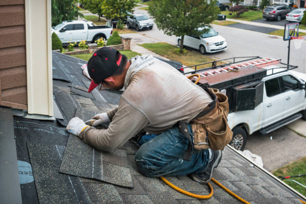Professional Roofing technician working in Arcadia, MI